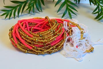 Waist Beads / Afrikaanse Heupketting - Osatome - Koraalroze-, Sieraden, Tassen en Uiterlijk, Kettingen, Ophalen of Verzenden, Nieuw