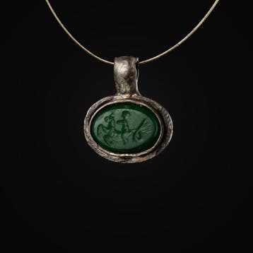 Oud-Romeins Zilver Pendant, Eros die op een hippocampus