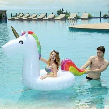 Heerlijk relaxen met deze grote Unicorn zwemband 115cm, Nieuw