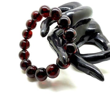Armband met grote Baltisch amber kralen in kersenkleur, 15