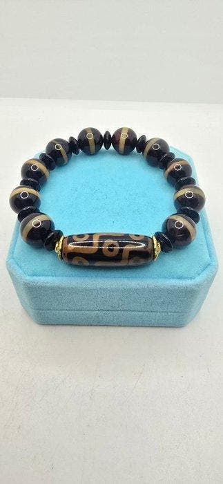 Tibetaanse armband met Dzi van 9 ogen - Ultieme bescherming