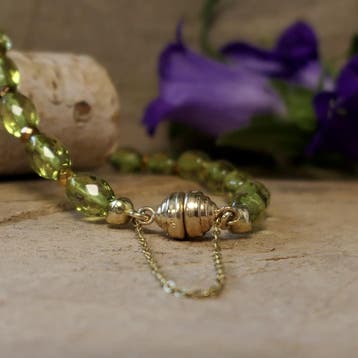 9 karaat peridoot kralen armband (Schakelarmband), Gebruikt, Geel, Ophalen of Verzenden, Met edelsteen