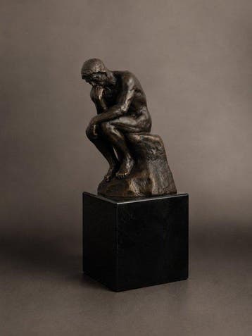 sculptuur, ‘De Denker’ – naar Auguste Rodin – gesigneerd –