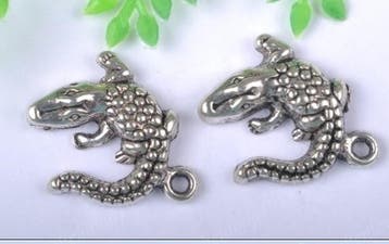 6 x tibetaans zilveren bedeltje van een krokodil 14 x 14mm, Ophalen of Verzenden, Nieuw, Bedel