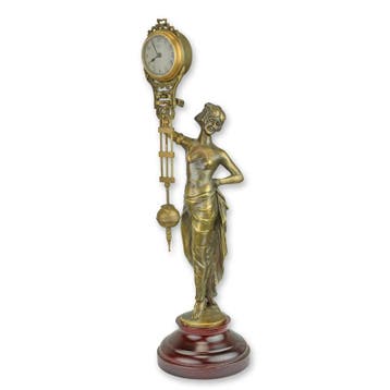 A TABLE CLOCK MYSTERIEUSE HELT BY A WOMAN (Interieur), Verzenden, Nieuw