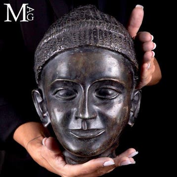 Bronzen portretkop geïnspireerd op de koninklijke