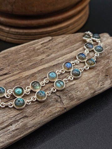 Uniek stuk: dubbele schakelarmband van 925 zilver met blauwe