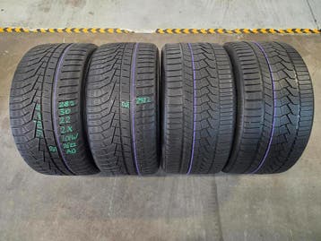 285/30/22 101W AO HANKOOK/CONTINENTAL WINTERBANDEN 6MM PROF, Ophalen, Gebruikt, 285 mm, Overige maten