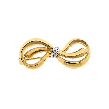 Bicolor gouden strik broche met diamant 0,02 ct; 14 karaat, Gebruikt, Ophalen of Verzenden, Met edelsteen, Goud