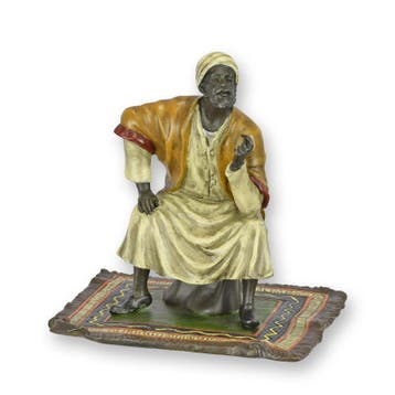 A BRONZE SCULPTURE OF AN ORIENTAL MERCHANT ON CARPET, Verzenden, Nieuw