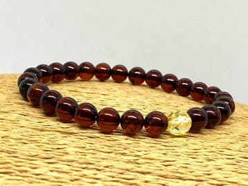 Rijke kersenkleur Baltische amber ronde kralenarmband &