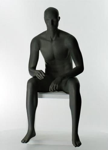 Zittende herenfiguren van merk gruppo corso