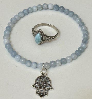 Natuurlijk larimar en aquamarijn uit Brazilië met Hand van