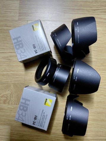 Nikon BATCH VAN ORIGINELE NIKON ZONNEKAPPEN, Nieuw