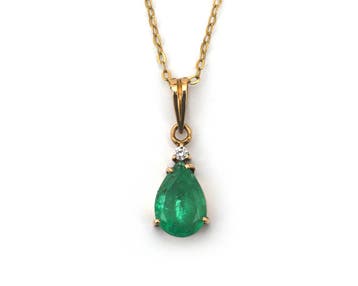 18 krt. gouden collier met hanger met smaragd en diamant, Gebruikt
