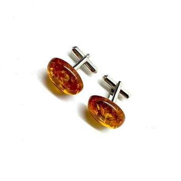 Stijlvolle manchetknopen met Baltisch barnsteen cabochons -