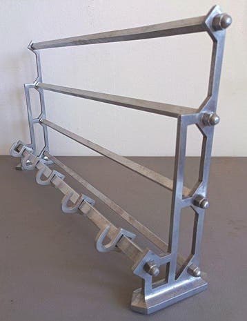 Art-deco bauhaus coat rack and hat rack (train-rack style) .