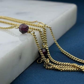 Gouden gourmetschakel ketting met granaat, Gebruikt, Ophalen of Verzenden, Met edelsteen, Goud