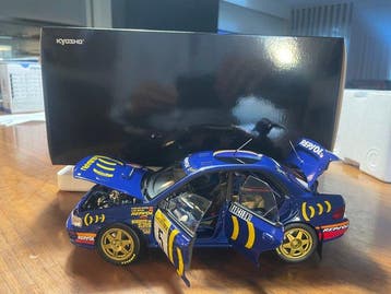 Kyosho 1:18 - Modelauto - Subaru Impreza 1995 Monte-Carlo #5, Nieuw