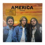 America - Homecoming Limited Edition Flaming Gold Vinyl (LP), Verzenden, Nieuw in verpakking
