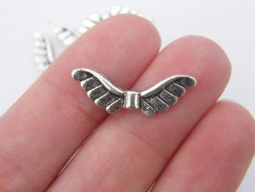 10 x metalen engelen vleugel kraal 23 x 8 x 2mm gat 1mm (..., Hobby en Vrije tijd, Kralen en Sieraden maken, Ophalen of Verzenden