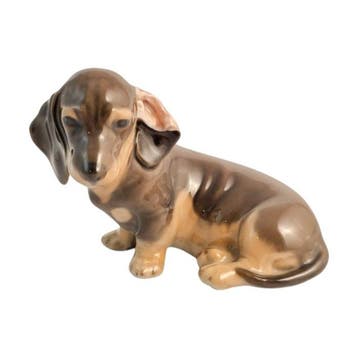 Royal Copenhagen - Beeldje - Dachshund sitting on its side