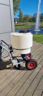 Melk transporter met mixer, Ophalen