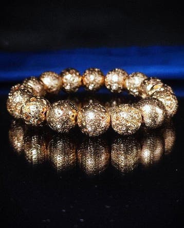 Geen minimumprijs – Prachtige gouden lavaarmband,