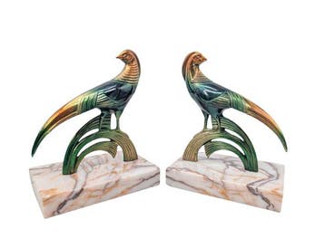 Élégante paire de serre-livres Art Déco, représentant des