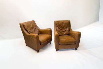 Fauteuil (2) - Leder - Een stel cognac fautuils