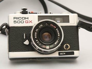 Ricoh 500GX con Rikenon 2,8/40mm | Meetzoeker camera (Zonder, Nieuw