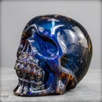 Natuurlijke barnsteen schedel – expressieve sculptuur met