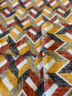 Exclusieve stof met geometrische patronen in dubbele hoogte,