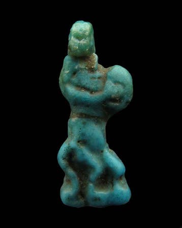 Oud-Egyptisch Faience amulet van de god Bes met een