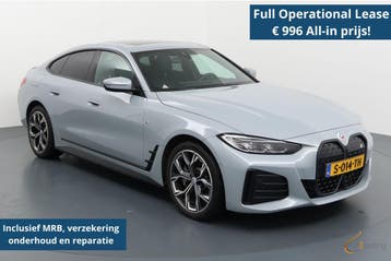 BMW i4 eDrive40 M Sport | Leder | Trekhaak | High exe.| 30m, Achterwielaandrijving, Zwart, Elektrisch, Elektronische parkeerrem