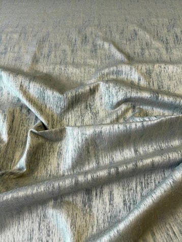 Elegante en scenografische stof met een abstract ontwerp dat