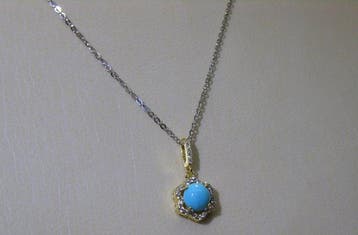 Turquoise Halsketting - Hoogte: 19 mm - Breedte: 9 mm- 2.26