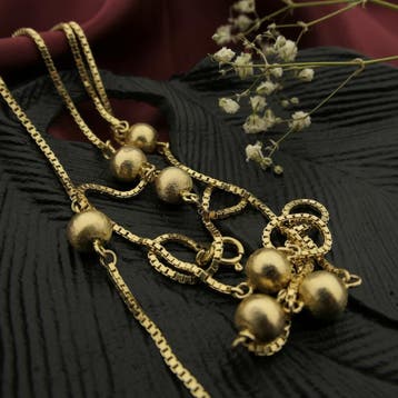 Lange gouden schakelketting met bolletjes, Ophalen of Verzenden, Gebruikt, Overige kleuren, Goud
