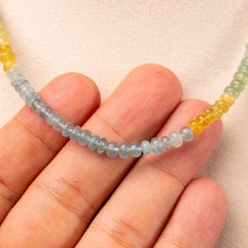 Beryl-ketting: aquamarijn en heliodor in tinten blauw en