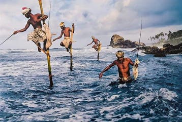 Steve McCurry (1950–) - Fishermen at Weligama. Sri Lanka,