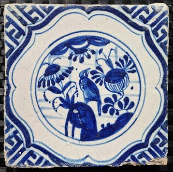 Tegel - Antieke Delftsblauwe tegel met vogel op rots, zgn.