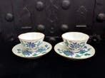 Een paar theekopjes met schotel. China, Qing-dynastie,