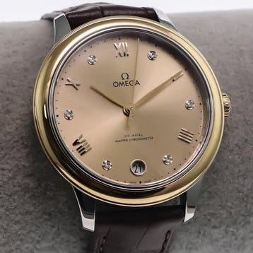 OMEGA - 34 mm, Stainless steel and yellow gold on a leather, Nieuw