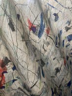 Prachtige stof in Pollock-stijl ontworpen door Beppe