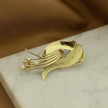Gouden abstracte broche met glaskristal, Gebruikt, Ophalen of Verzenden, Met edelsteen, Goud