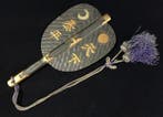 Iron-ground, gold-decorated war fan (gunbai uchiwa) /