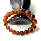 Armband met Baltische barnsteen kralen in cognakkleur. -