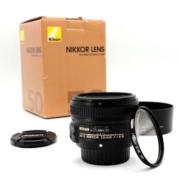 Nikon AF-S 50mm f/1.8G met HB-47 zonnekap, filter en, Nieuw
