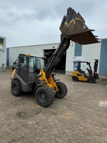 Wiellader AHLMANN AX 1000- uren 1.876, Ophalen, Wiellader of Shovel