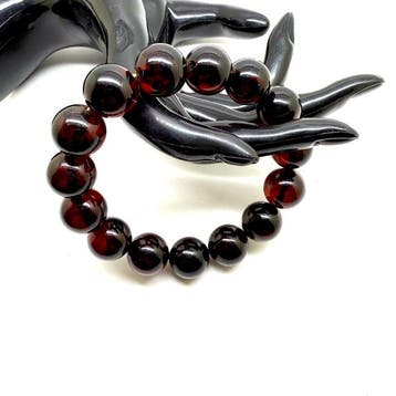 Armband met grote Baltische amber kralen in kersenkleur, 15